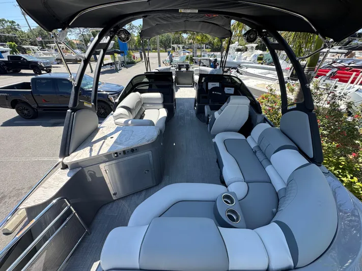  Yacht Photos Pics 2025 Avalon Excalibur 27' boat interior with luxurious seating and modern design.