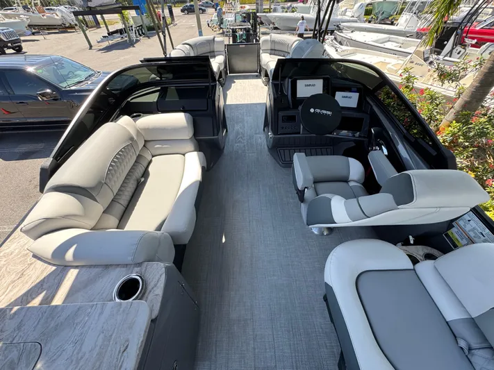  Yacht Photos Pics Luxurious 2025 Avalon Excalibur 27' boat interior with plush seating and modern design.