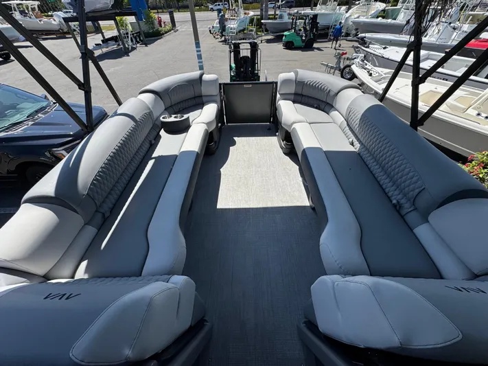  Yacht Photos Pics Luxurious 2025 Avalon Excalibur 27' pontoon boat with spacious seating and modern design.