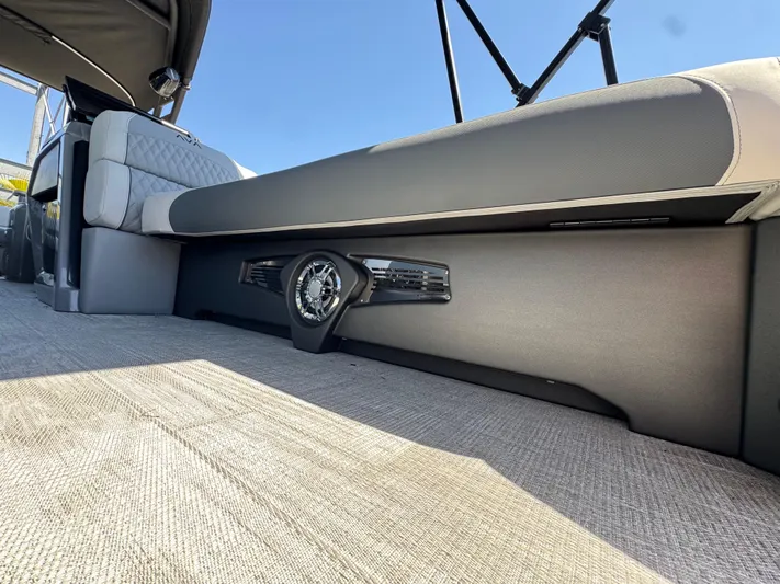  Yacht Photos Pics 2025 Avalon Excalibur 27' boat interior with sleek seating and integrated speaker system.