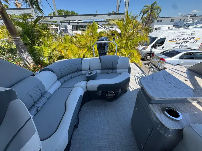  Yacht Photos Pics Luxurious 2025 Avalon Excalibur 27' boat interior with plush seating and modern amenities.