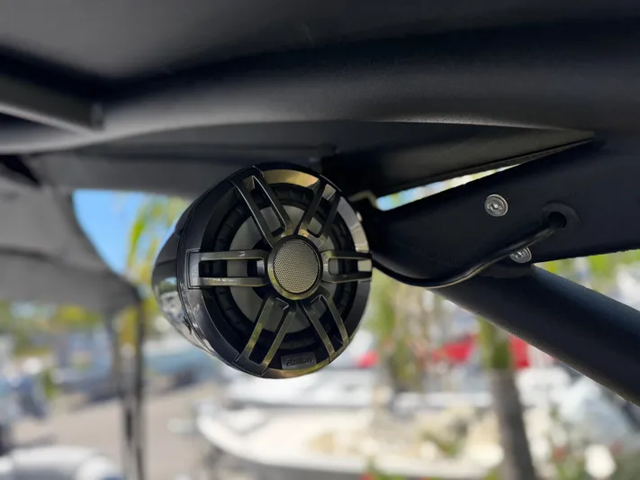  Yacht Photos Pics Speaker mounted on Avalon Excalibur 27' boat, 2025 model, under a canopy.