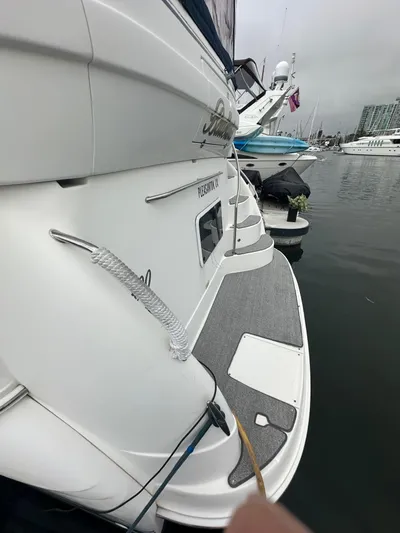 Ballerina Yacht Photos Pics 2004 Sea Ray 390 Motor Yacht docked, showcasing sleek design and spacious deck.