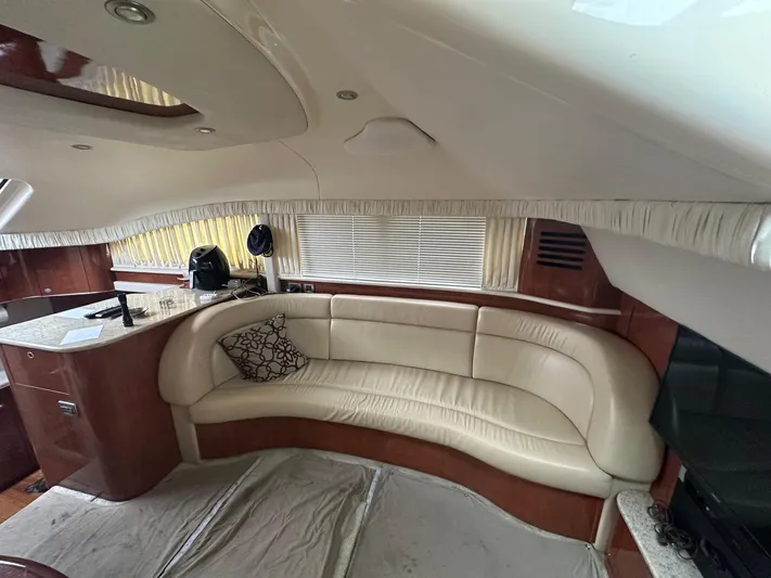 Ballerina Yacht Photos Pics Luxurious interior of 2004 Sea Ray 390 Motor Yacht with leather seating and elegant design.