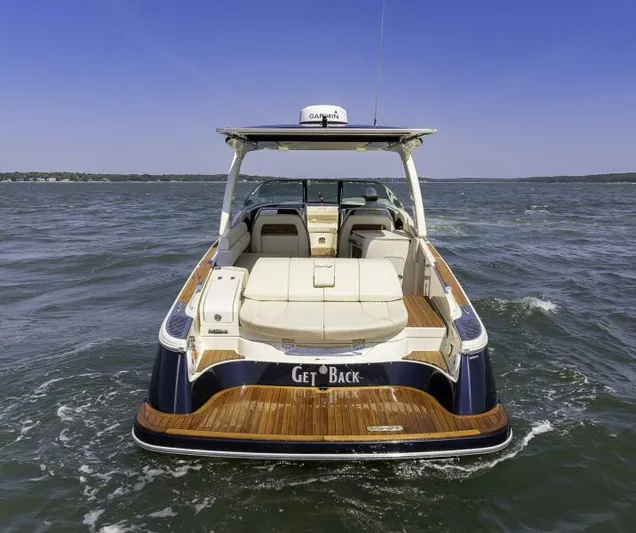 Get Back Yacht Photos Pics 2022 Chris-Craft Launch 31 GT boat on water, rear view, luxury design.