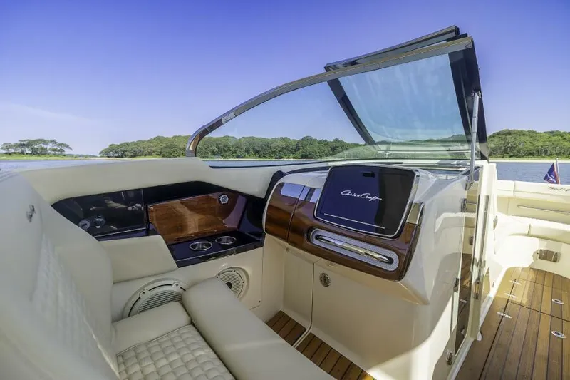Get Back Yacht Photos Pics 2022 Chris-Craft Launch 31 GT interior with luxurious seating and sleek dashboard design.