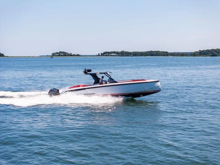 Outrageous Yacht Photos Pics 2024 Vanquish Yachts VQ 40 cruising on open water.