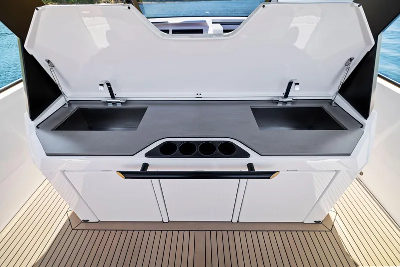 Outrageous Yacht Photos Pics Modern outdoor kitchen on the 2024 Vanquish Yachts VQ 40.