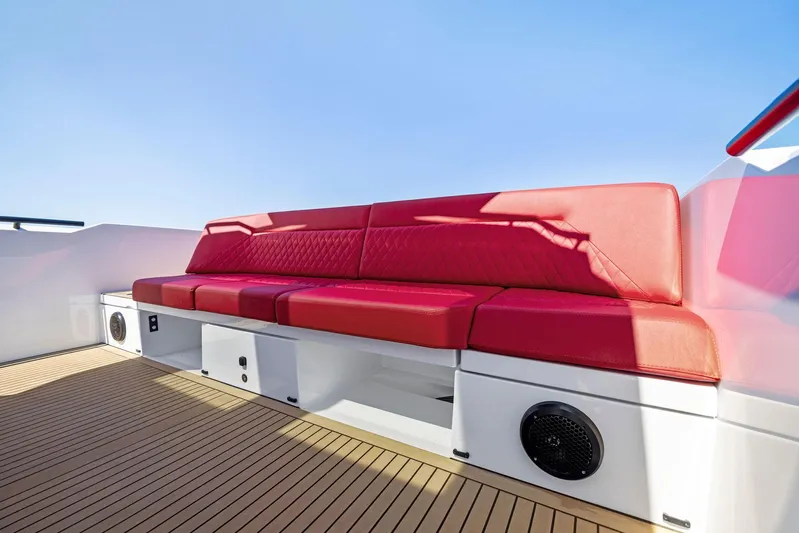 Outrageous Yacht Photos Pics Red seating on the 2024 Vanquish Yachts VQ 40 deck.