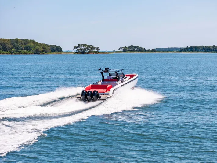 Outrageous Yacht Photos Pics 2024 Vanquish Yachts VQ 40 cruising on open water.