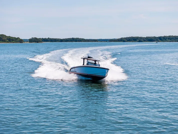 Outrageous Yacht Photos Pics 2024 Vanquish Yachts VQ 40 cruising on open water.