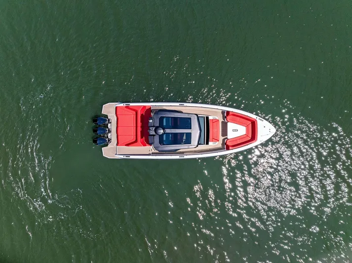 Outrageous Yacht Photos Pics Aerial view of 2024 Vanquish Yachts VQ 40 on water.