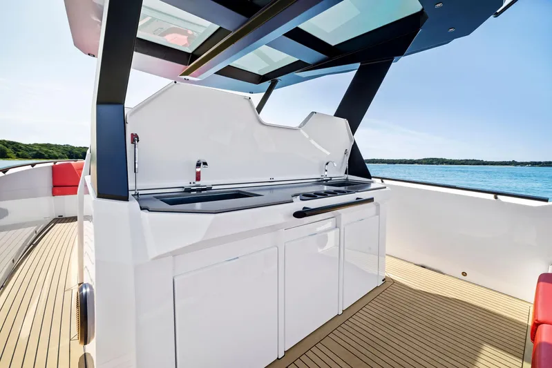 Outrageous Yacht Photos Pics 2024 Vanquish Yachts VQ 40 yacht deck with modern outdoor kitchen.