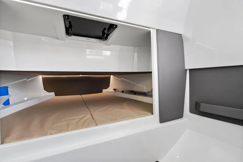 Outrageous Yacht Photos Pics 2024 Vanquish Yachts VQ 40 interior cabin with modern design and ample storage.