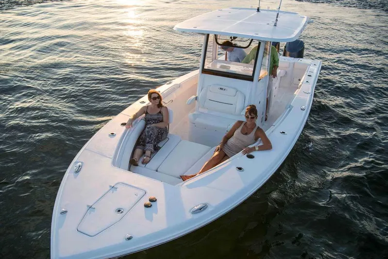  Yacht Photos Pics Manufacturer Provided Image: 2018 Sea Hunt Gamefish 30 boat with forward seating on calm water.