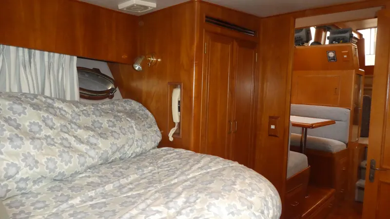 Morning Star Yacht Photos Pics 1993 Ocean Alexander 440 Sundeck CPMY interior with cozy bedroom and dining area.