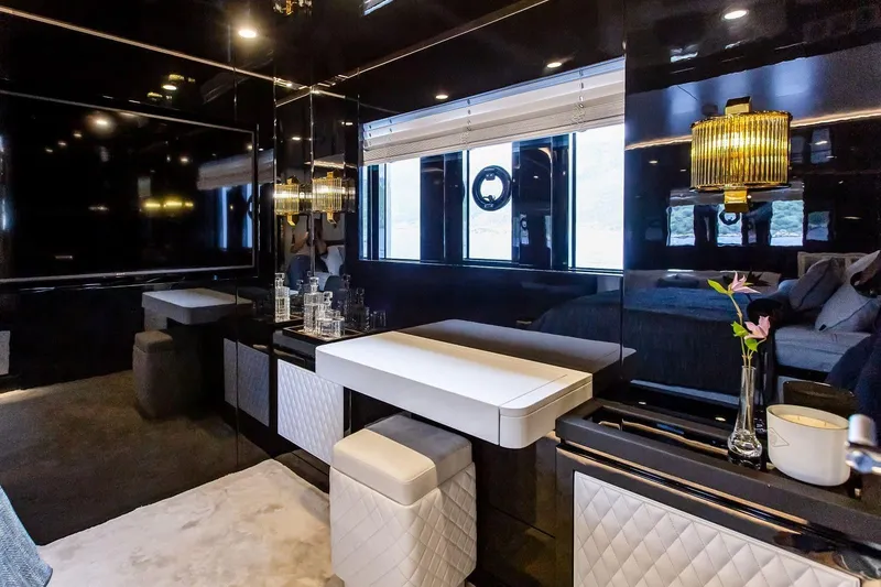  Yacht Photos Pics Luxurious interior of 2022 Bering 70 yacht with elegant furnishings and modern decor.