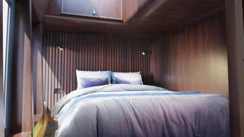  Yacht Photos Pics Modern bedroom interior in Archipelago 47, 2025 model, featuring wooden walls and cozy bedding.