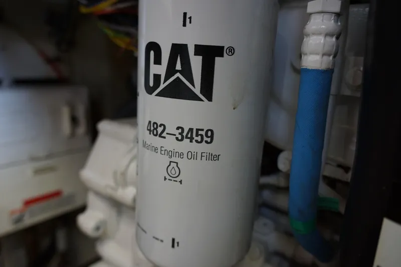 Musn't Touch It Yacht Photos Pics CAT marine engine oil filter in a 1996 Egg Harbor 38 Sport Fish boat.