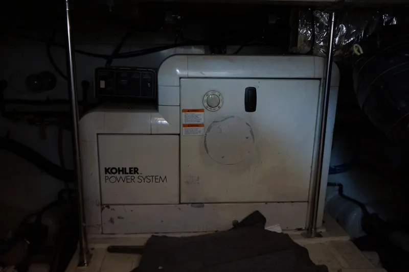 Musn't Touch It Yacht Photos Pics Kohler power system in 1996 Egg Harbor 38 Sport Fish engine room.