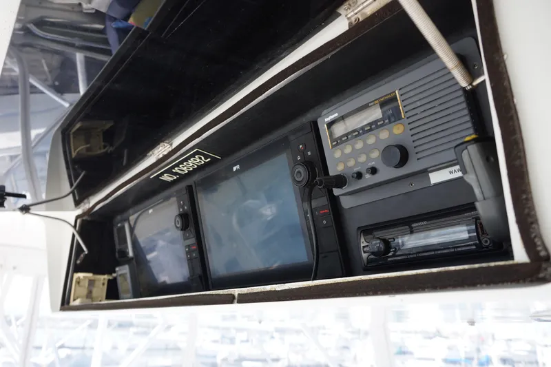 Musn't Touch It Yacht Photos Pics Navigation equipment on a 1996 Egg Harbor 38 Sport Fish boat.