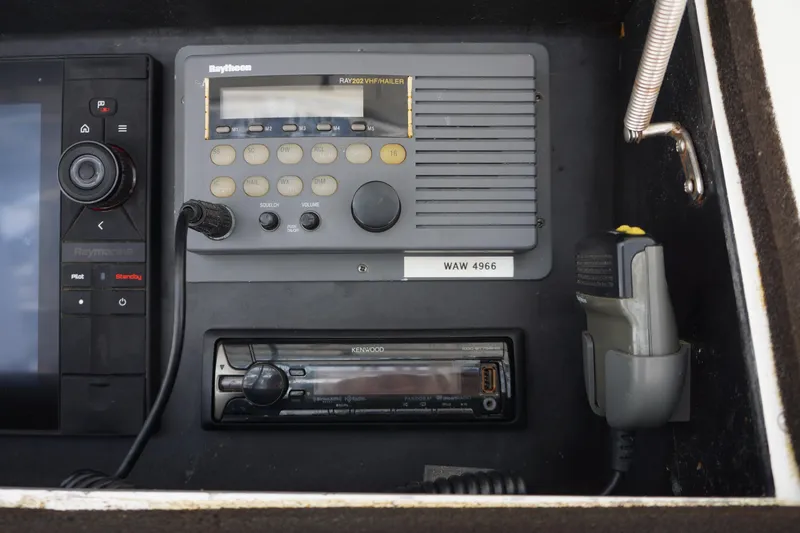 Musn't Touch It Yacht Photos Pics Control panel of a 1996 Egg Harbor 38 Sport Fish boat with radio and navigation equipment.