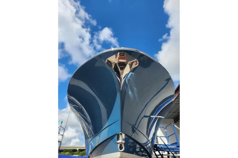  Yacht Photos Pics 2019 Mag Bay 33 CC boat hull against a bright blue sky.