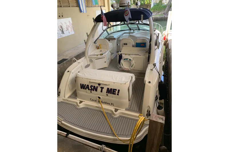 Wasn't Me Yacht Photos Pics 2006 Sea Ray 340 Sundancer docked, rear view with "Wasn't Me!" nameplate, Coral Gables, FL.