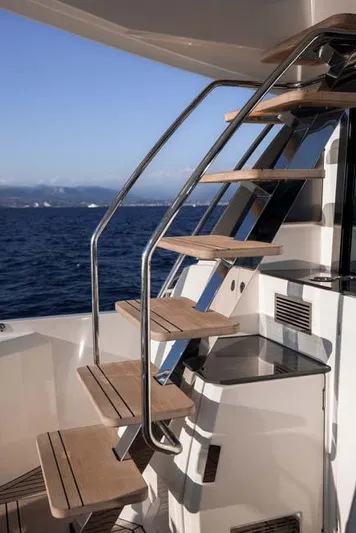  Yacht Photos Pics Staircase on 2019 Prestige 680 S yacht with ocean view.