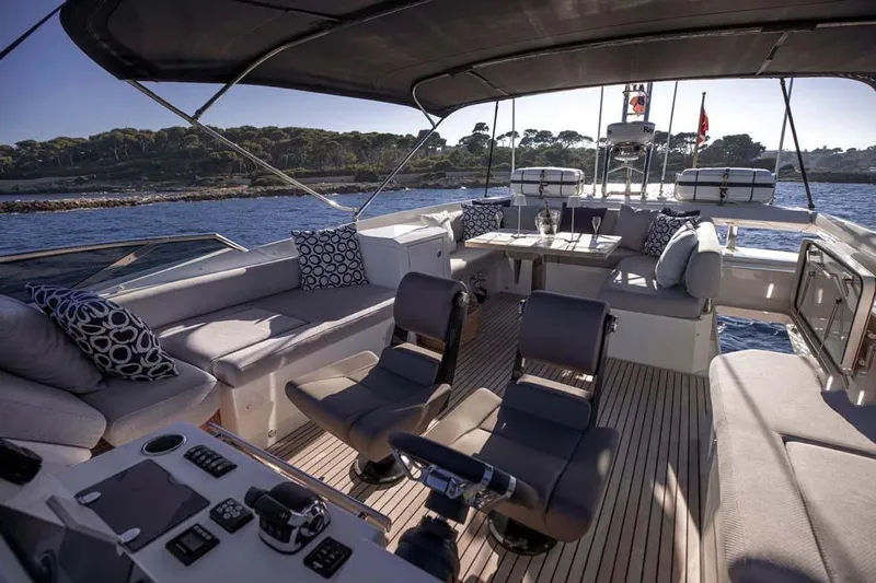  Yacht Photos Pics Luxurious 2019 Prestige 680 S yacht interior with elegant seating and scenic ocean view.