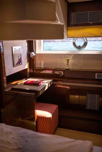  Yacht Photos Pics Luxurious interior of 2019 Prestige 680 S yacht with elegant desk and seating.