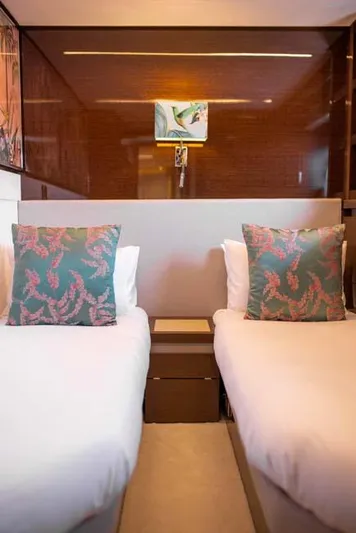  Yacht Photos Pics Luxurious twin cabin interior of 2019 Prestige 680 S yacht with elegant decor.
