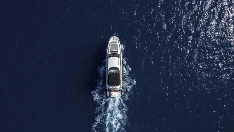  Yacht Photos Pics Aerial view of 2019 Prestige 680 S yacht cruising on open water.