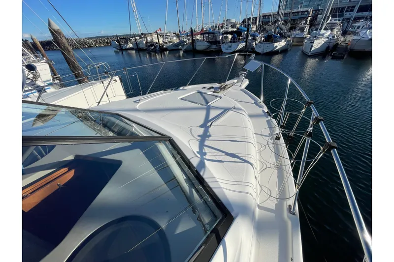 Happy Phantom Yacht Photos Pics 1996 Bayliner 4087 Aft Cabin Motoryacht docked at marina, sunny day.
