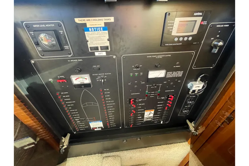 Happy Phantom Yacht Photos Pics 1996 Bayliner 4087 Aft Cabin Motoryacht control panel with gauges and switches.