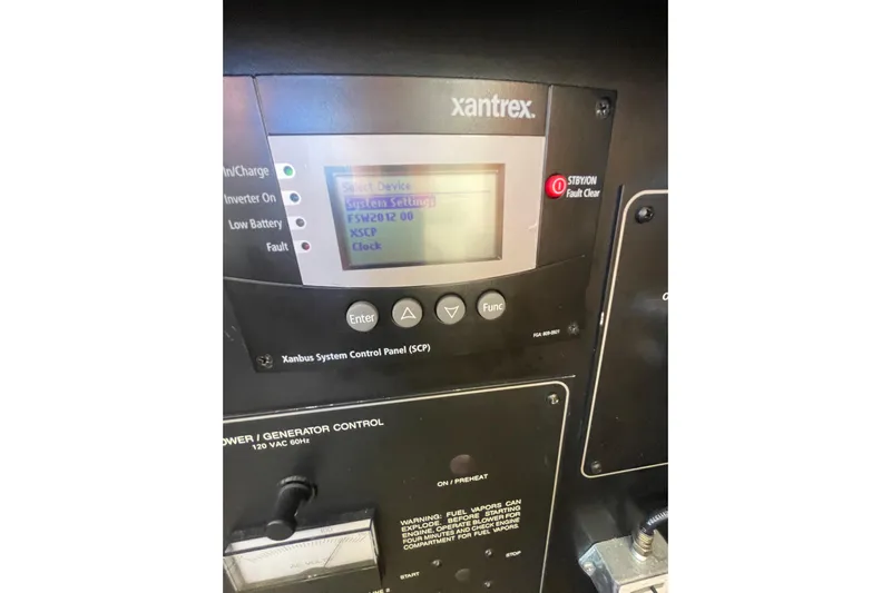 Happy Phantom Yacht Photos Pics Control panel of 1996 Bayliner 4087 Aft Cabin Motoryacht with Xantrex system.