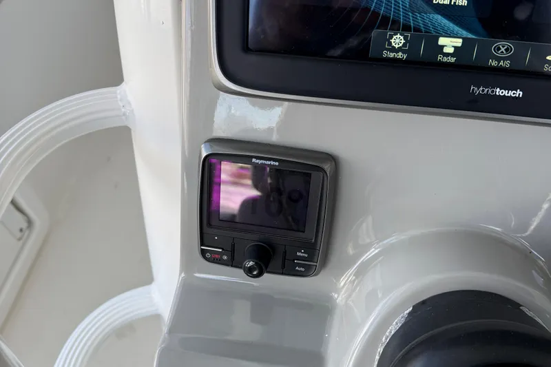  Yacht Photos Pics Control panel of a 2016 Boston Whaler 330 Outrage boat with navigation display.