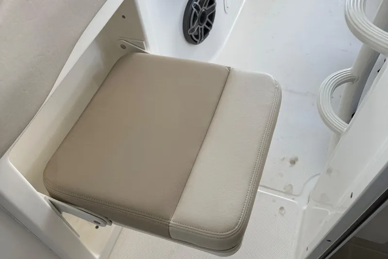  Yacht Photos Pics Foldable seat on 2016 Boston Whaler 330 Outrage boat interior.
