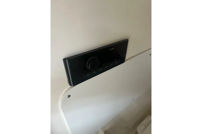  Yacht Photos Pics Control panel on 2016 Boston Whaler 330 Outrage boat interior.