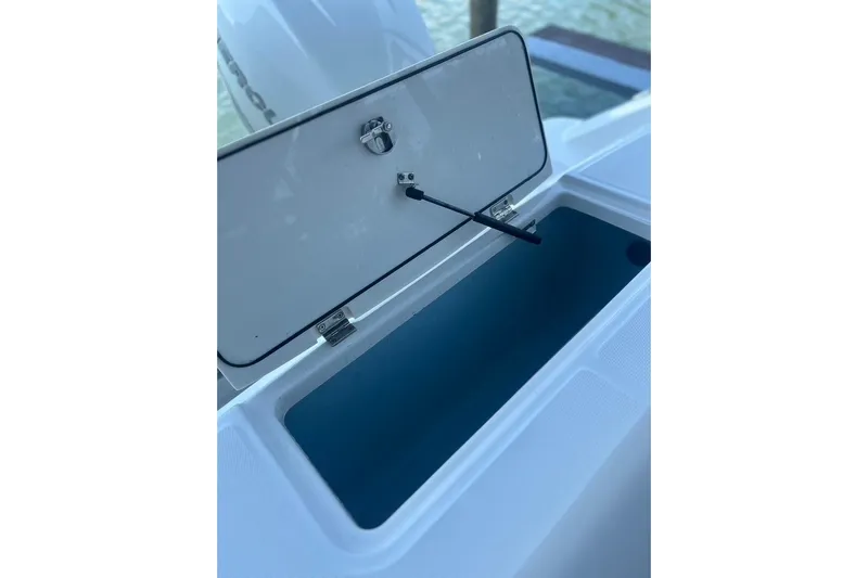  Yacht Photos Pics Open storage compartment on 2016 Boston Whaler 330 Outrage boat.