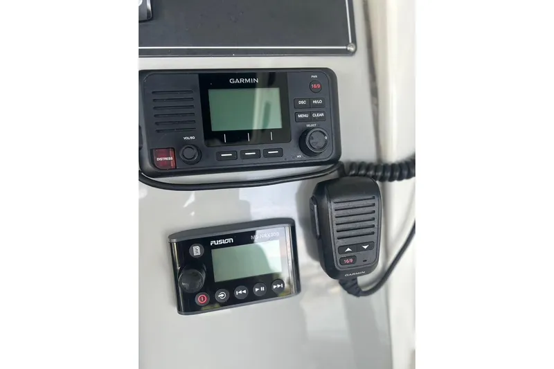  Yacht Photos Pics Garmin and Fusion marine electronics on 2016 Boston Whaler 330 Outrage dashboard.