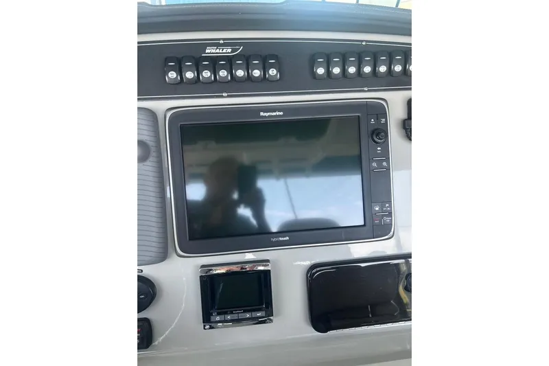  Yacht Photos Pics Control panel of a 2016 Boston Whaler 330 Outrage with Raymarine display.