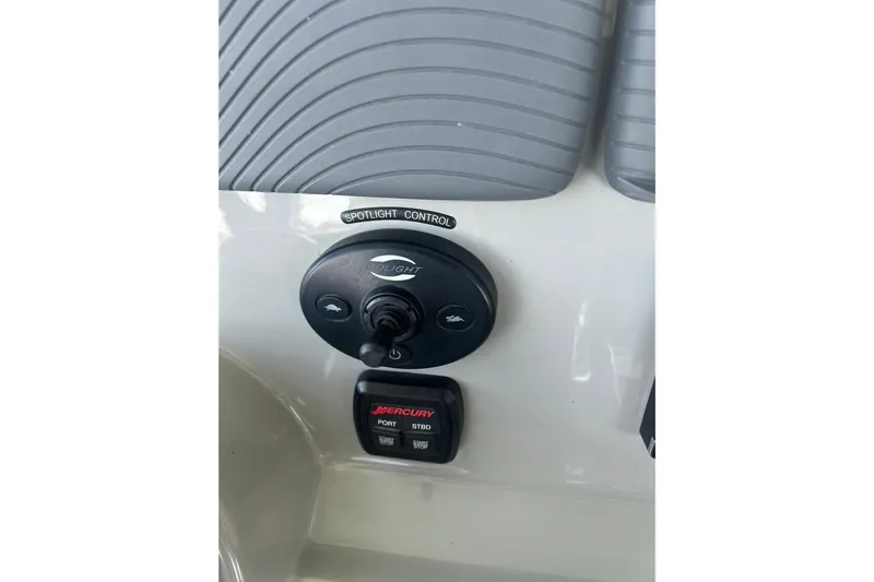  Yacht Photos Pics Spotlight control panel on 2016 Boston Whaler 330 Outrage boat dashboard.