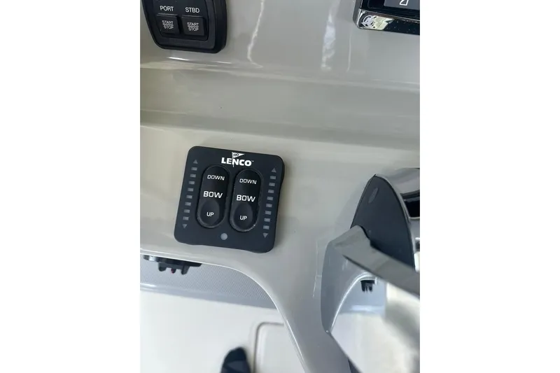  Yacht Photos Pics Control panel of a 2016 Boston Whaler 330 Outrage boat with Lenco trim tab switches.
