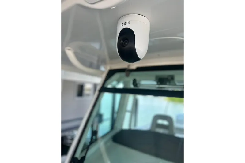  Yacht Photos Pics Security camera inside 2016 Boston Whaler 330 Outrage boat, focused on interior details.