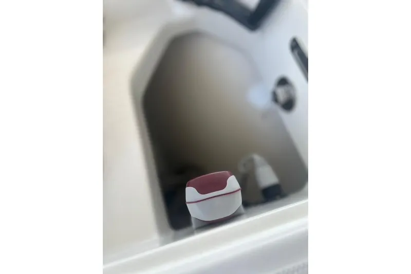  Yacht Photos Pics Storage compartment on a 2016 Boston Whaler 330 Outrage boat interior.