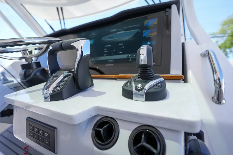  Yacht Photos Pics 2024 Regal 38 SAV helm with advanced controls and touchscreen display.