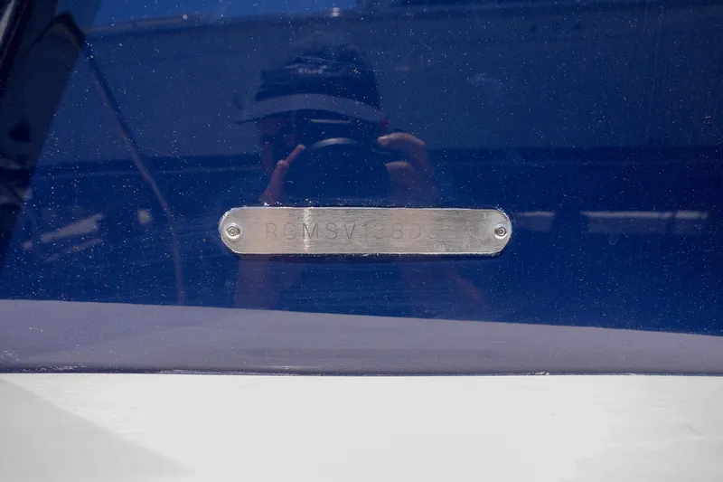  Yacht Photos Pics 2024 Regal 38 SAV nameplate on a reflective surface.