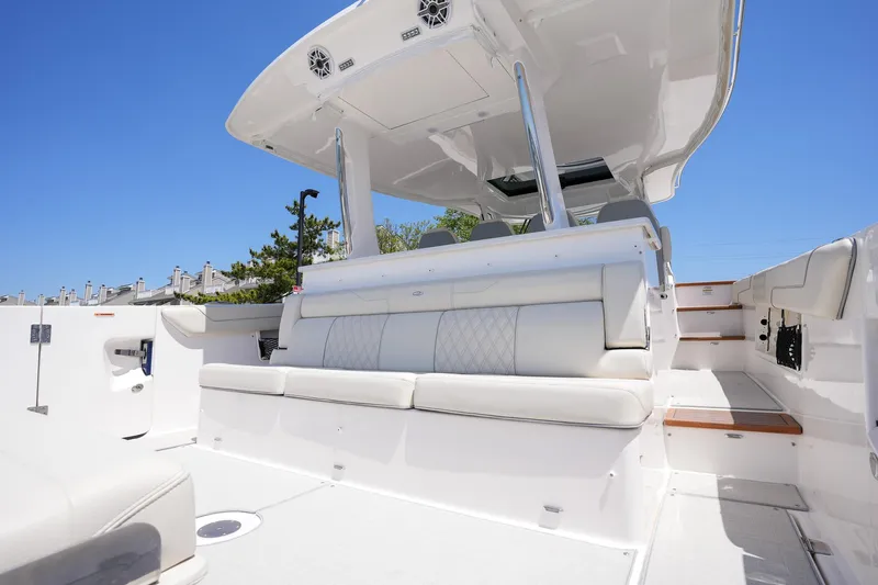  Yacht Photos Pics 2024 Regal 38 SAV boat interior with white seating and modern design.