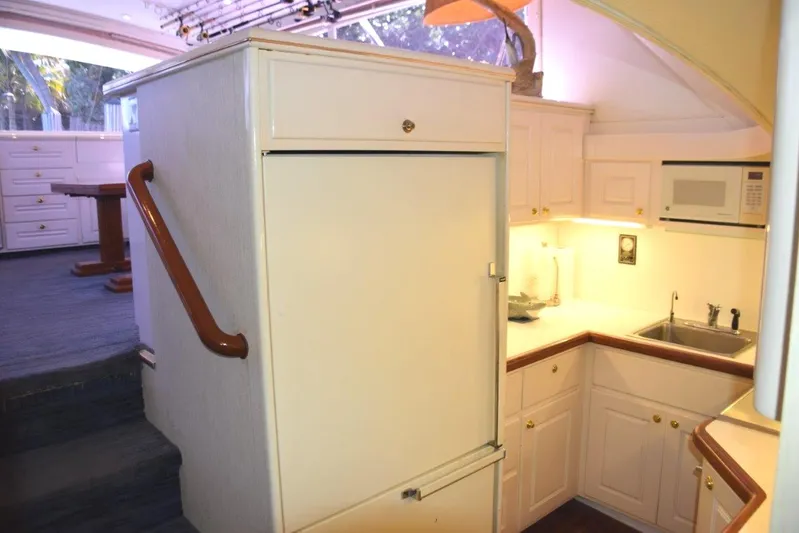 Low Bidder X Yacht Photos Pics Steps down to galley